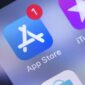 Apple iPhone with AppStore, iTunes, Music, Podcasts, Apple Store icons on the screen. Apple Inc. is an American multinational technology company. Moscow, Russia - October 14, 2018
